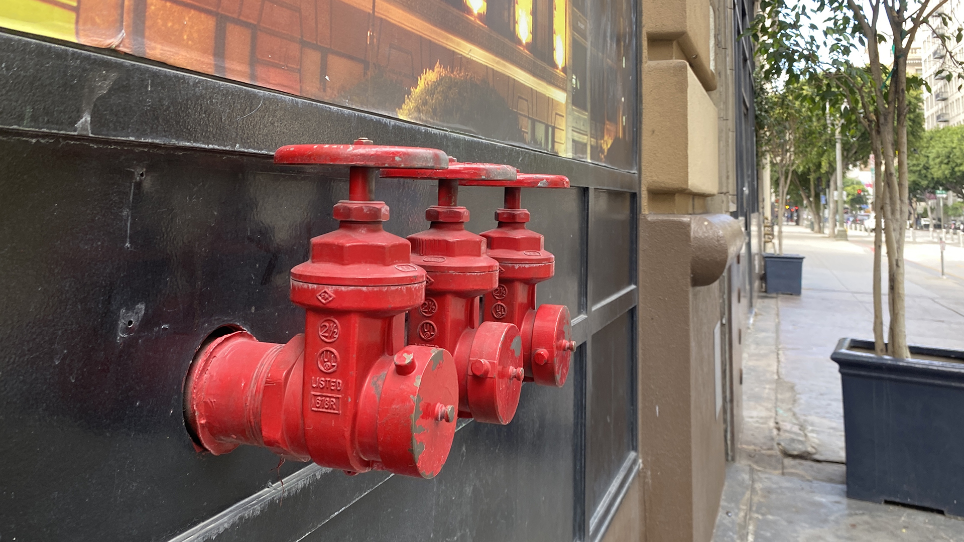 Red standpipes for fire dept to access a sprinkler system in Downtown LA
